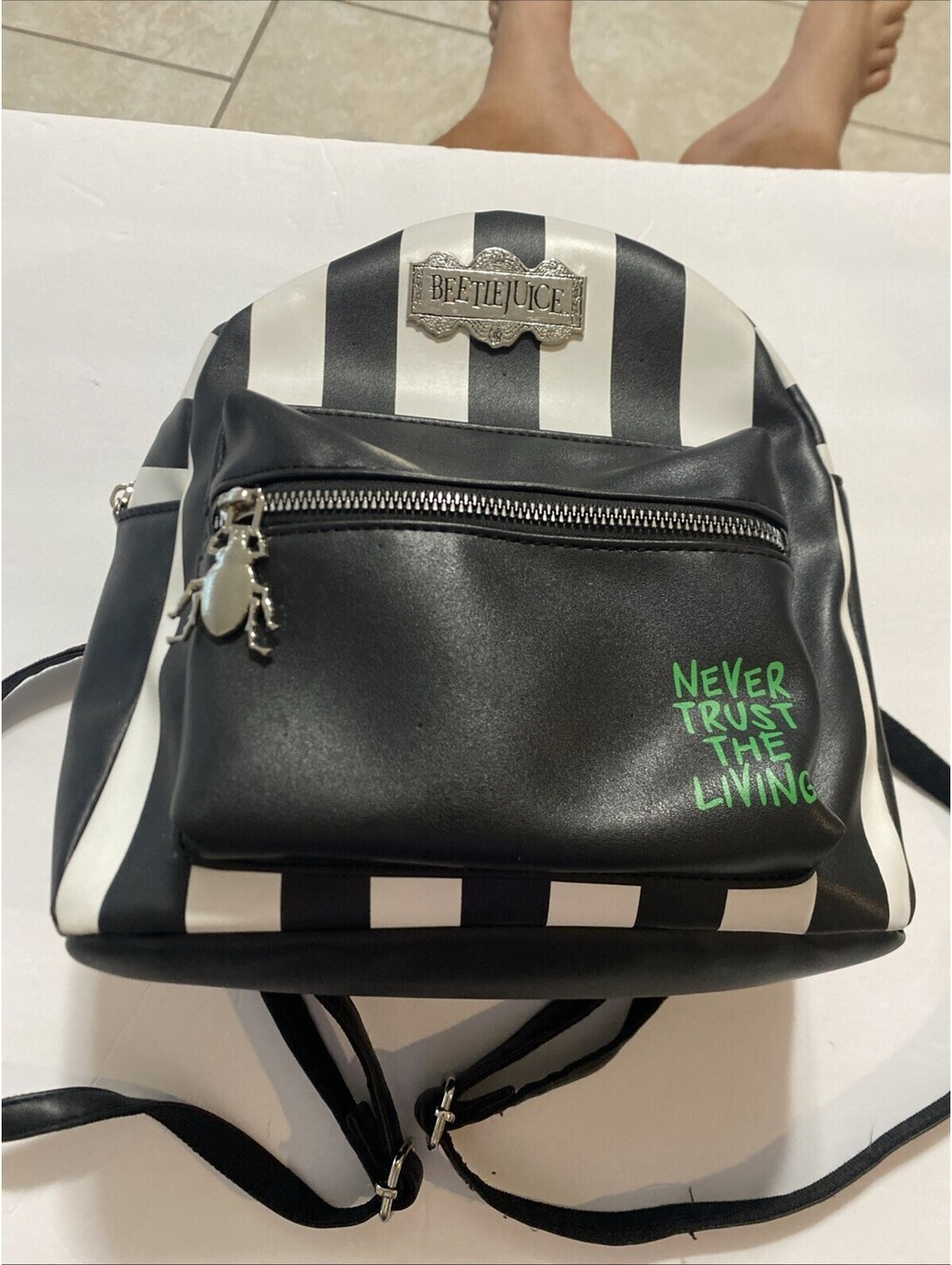 Beetlejuice Hot Topic Stripe “Never Trust The Living” Mini Backpack